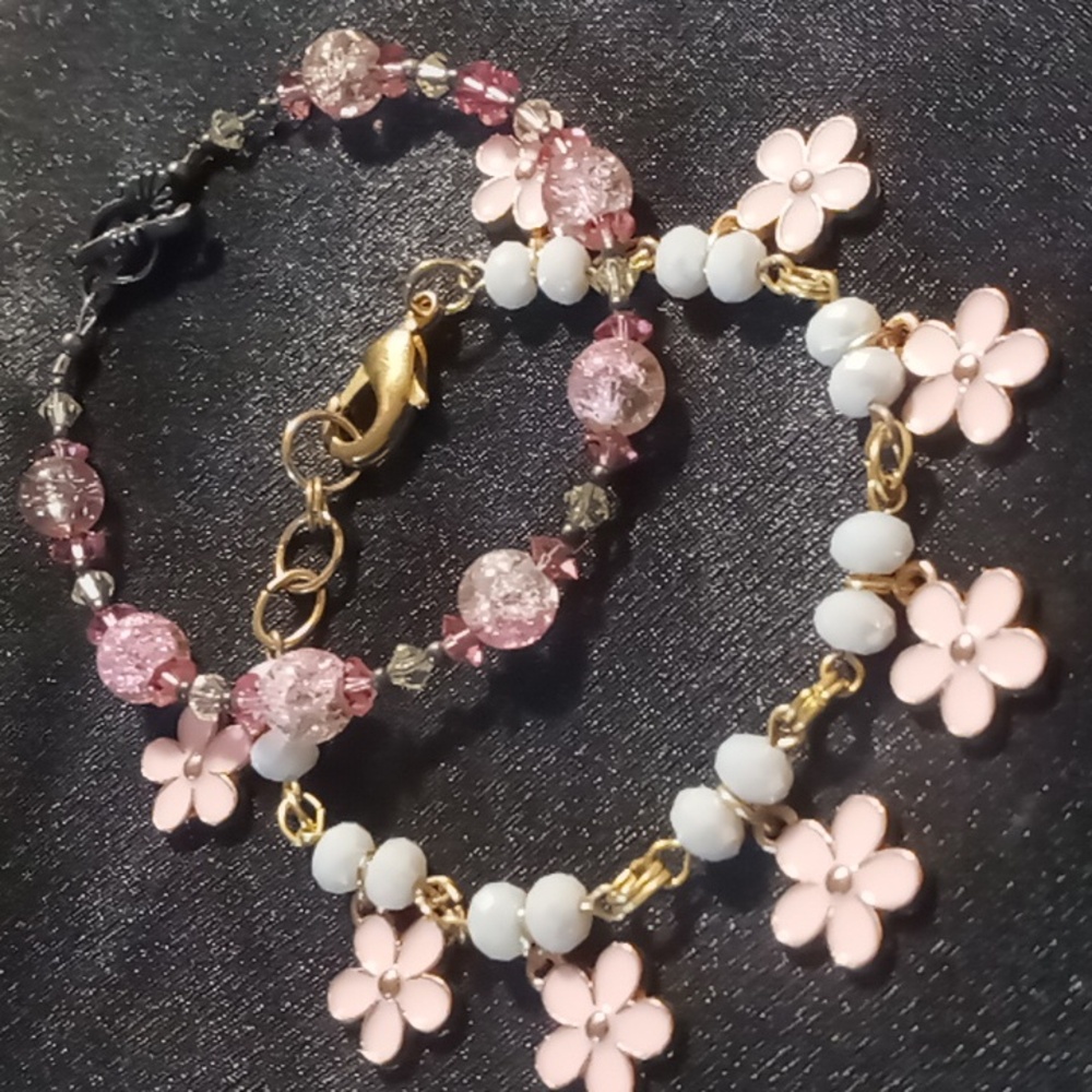 Girls bracelets 2 7.5 inches long strung on wire. Glass crystal cut & gold tone
